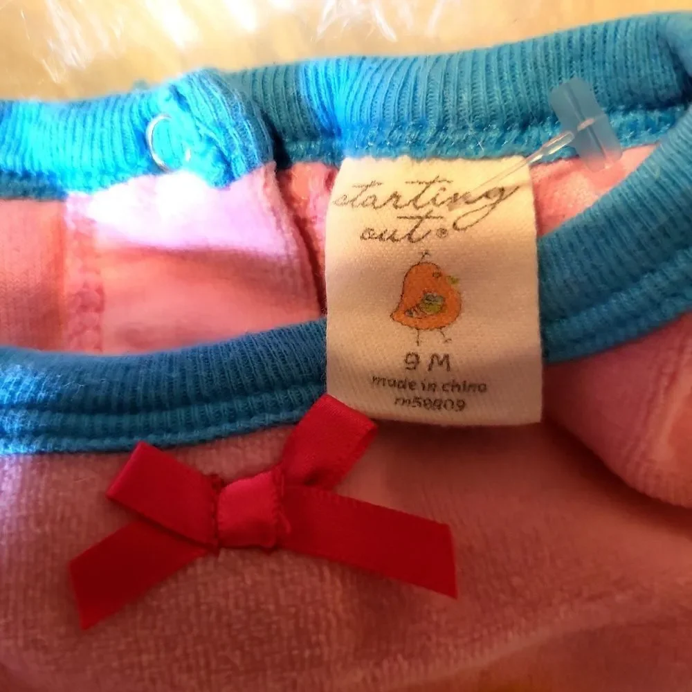 Brand new, pink one piece, velour so soft wit a cute cupcake and ruffled icing